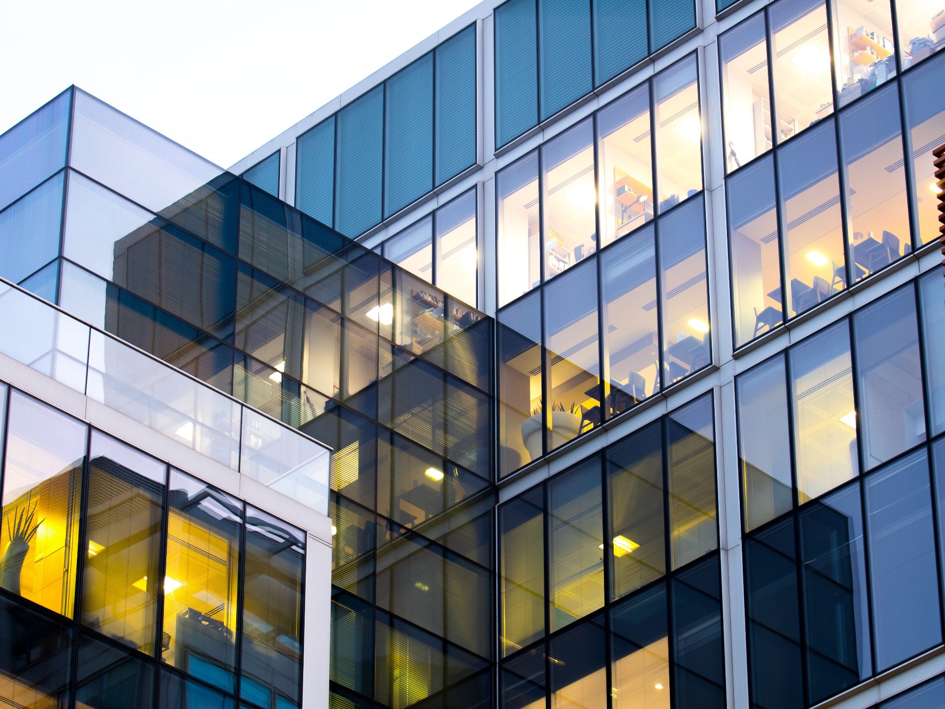 Modern London office building exterior at dusk representing employers liability and office insurance cover